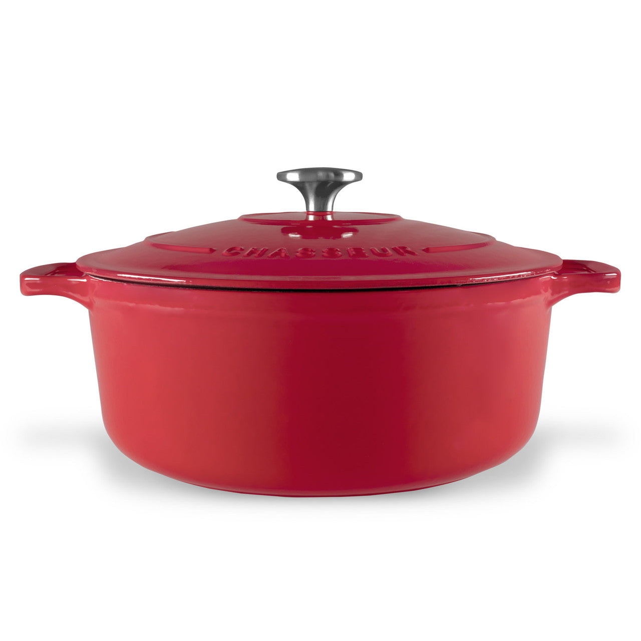 Red cast iron Dutch oven with a lid on a white background
