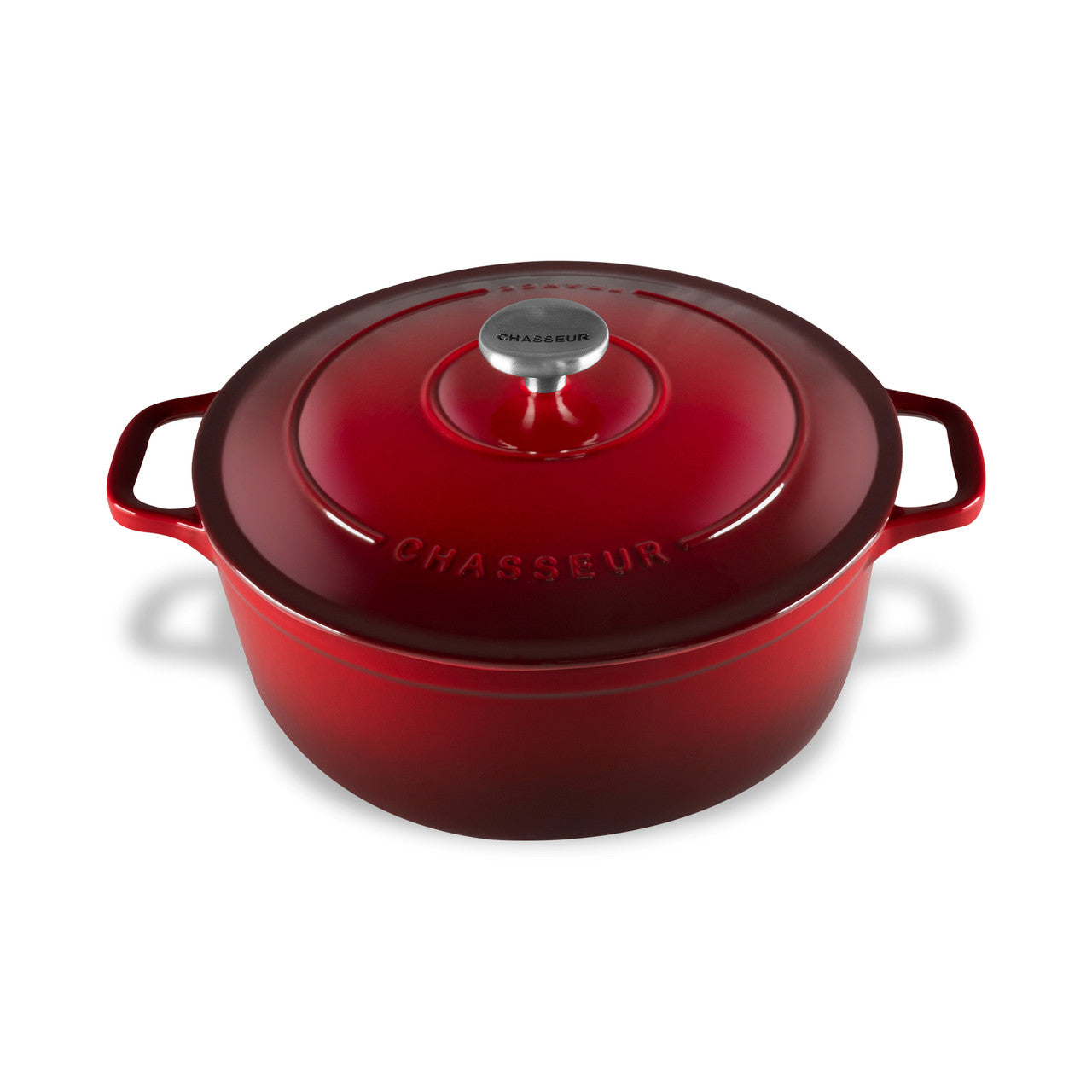Red cast iron Dutch oven with lid on a white background